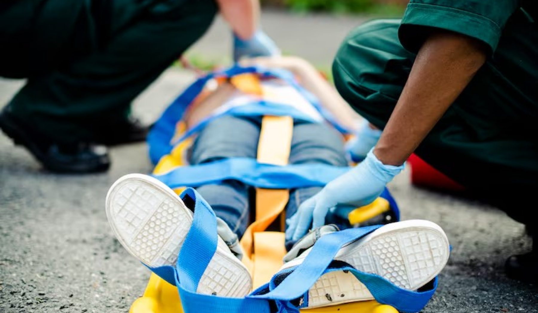 paramedic-team-rescuing-young-critical-patient_53876-139567