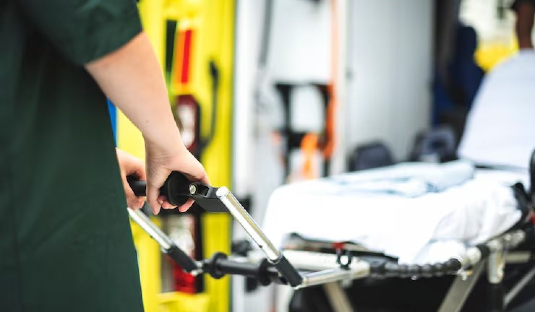 paramedics-work-with-ambulance_53876-144801